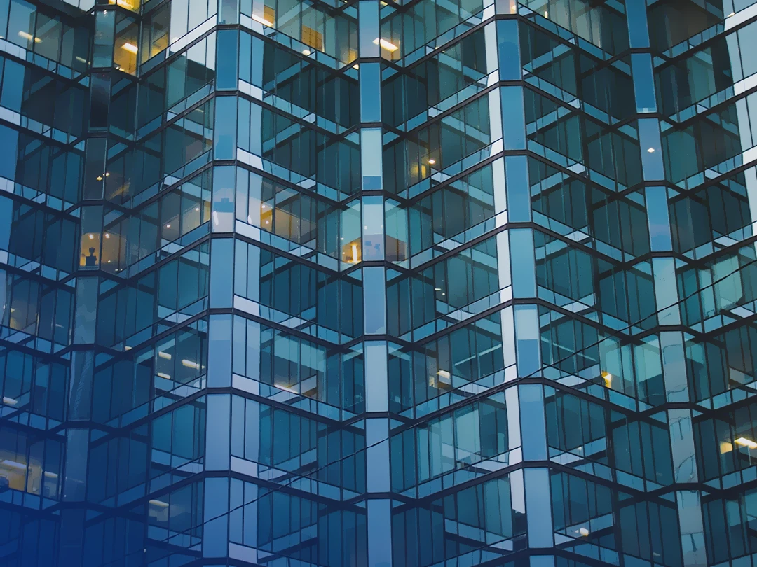 Tall Glass Office Building In London.