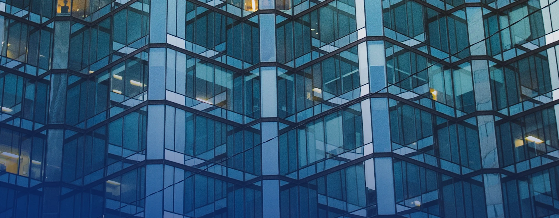 Tall Glass Office Building In London.