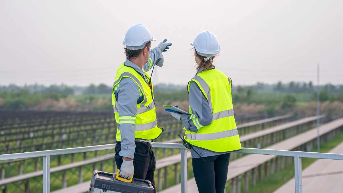 M&E Inspectors Overlooking Land Plot.